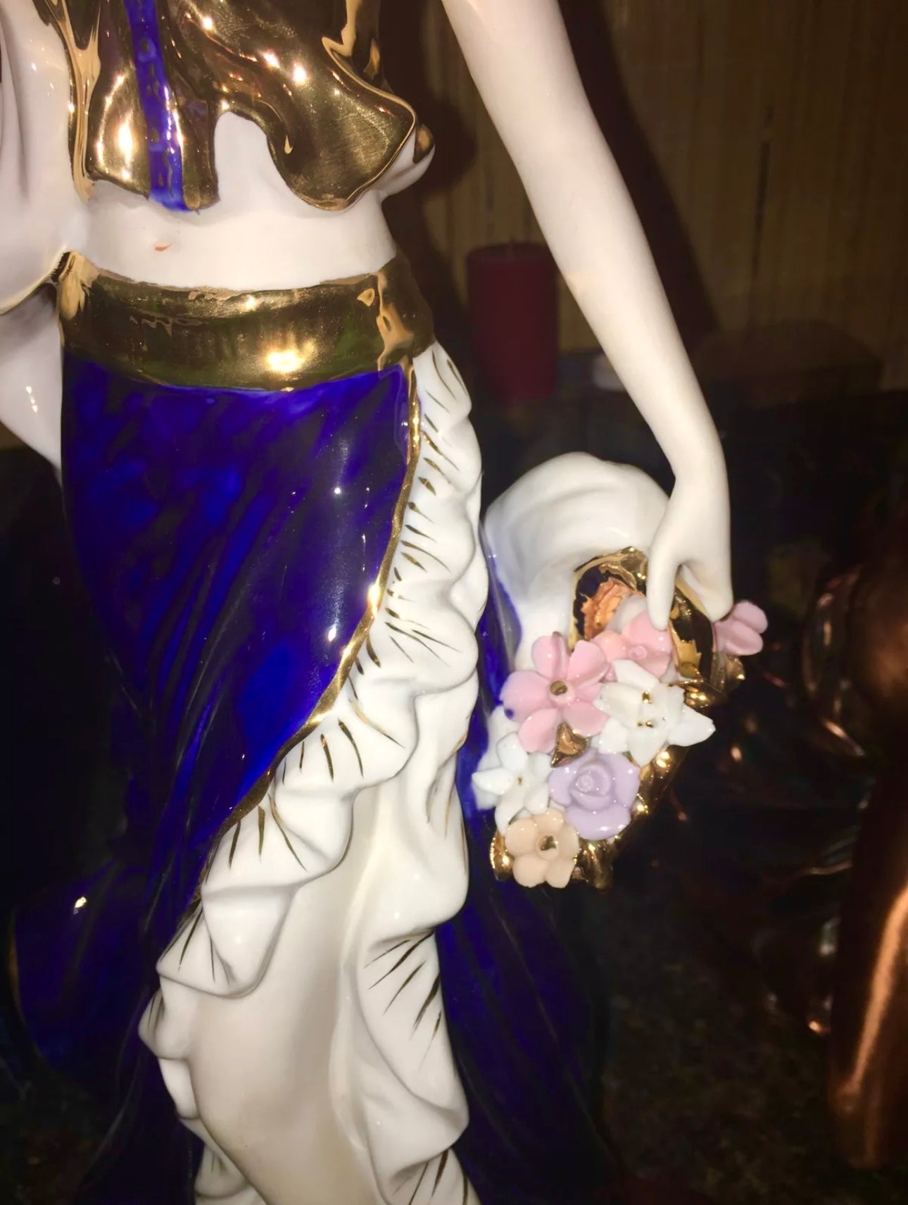 Flower girl in blue in fine porcelain from Spain