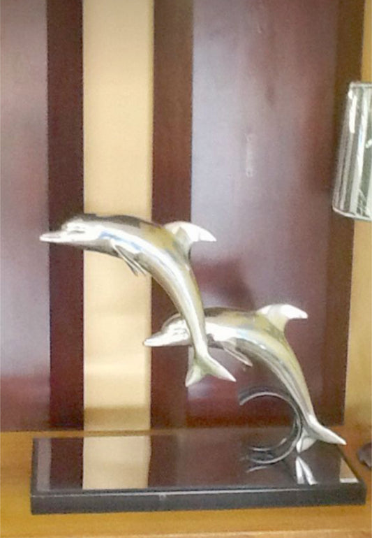 Pair of dolphins sculpture by shlomin Haziza